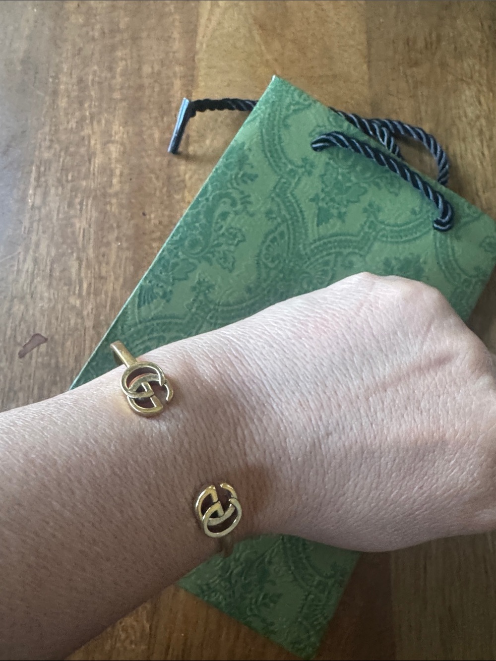 Gucci Gold-Tone Open Cuff Bracelet with Interlocking G Accents